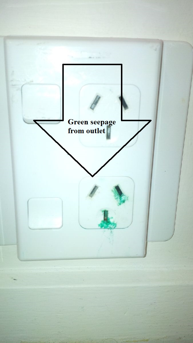 What is the green goo coming out of my twin and earth cable? Why is it  happening?